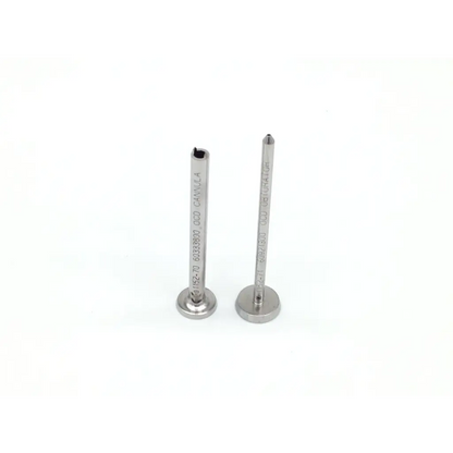 Two stainless steel zimmer herbert orthopedic bone screws with engraved markings and circular bases for whipple orthopedic bone use